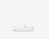 White closed toe slippers, view from the side 