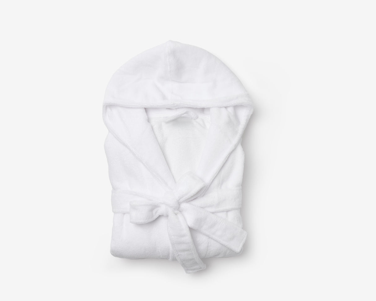 White hotel bathrobes with a hood, folded.