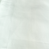 Close up view on a white satin band tablecloths.