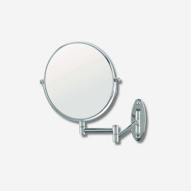 Oval wall mount hotel mirror.