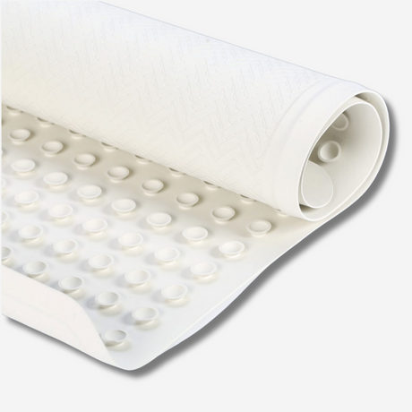White rubbermaid mat rolled up.